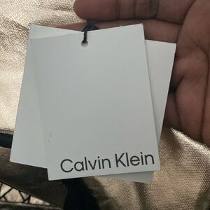 Calvin Klein large metallic duffle bag . New condition.